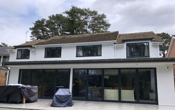 Rear of the extension with an elevated porcelain tiled patio.